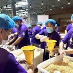 FedEx volunteers package 10,000 meals for Cebu students